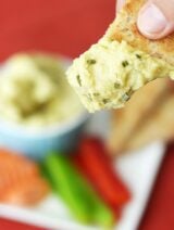 One whole jalapeño is added to my all time favorite traditional hummus.Whip this up quick for the thickest, creamiest, spiciest hummus, yet! www.showmetheyummy.com #jalapeno #hummus #dips #appetizers #spicy #pita #veggies #chickpeas #healthy #snack