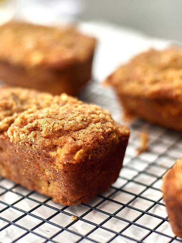 mini apple cake loaves on cooling rack