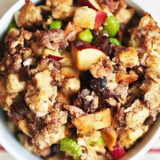 This best ever sausage stuffing is salty from the sausage, crunchy from the bread cubes, sweet and tart from the red delicious apples! Move over turkey, this best ever stuffing is ready to take the main stage! www.showmetheyummy.com #stuffing #thanksgiving #sausage