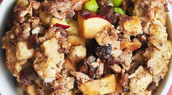 This best ever sausage stuffing is salty from the sausage, crunchy from the bread cubes, sweet and tart from the red delicious apples! Move over turkey, this best ever stuffing is ready to take the main stage! www.showmetheyummy.com #stuffing #thanksgiving