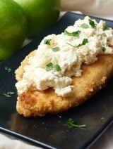 Goat Cheese Apple Chicken. Yum. Hot and juicy on the inside, slightly crunchy exterior, perfectly salty, and topped with the perfectly sweet, tart, and tangy apple and goat cheese. https://showmetheyummy.com #chicken #goatcheese #apple #breading