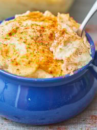 Gram’s creamy mashed potatoes are so thick and creamy from the super whipped potatoes and cream cheese, a little tangy from the sour cream, with just the right amount of crust from the paprika on top! The perfect side dish for any meal! www.showmetheyummy.com #mashedpotatoes #sidedish #holidaysides #creamymashedpotatoes