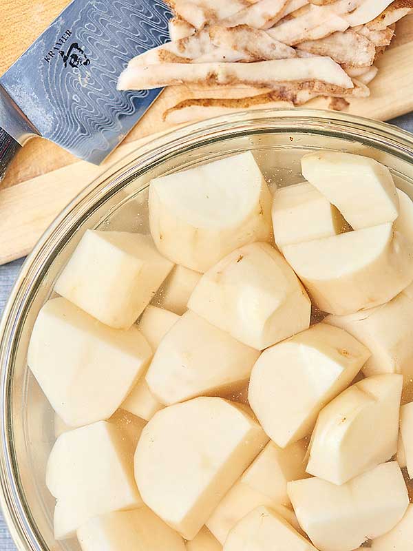 potato chunks in bowl above