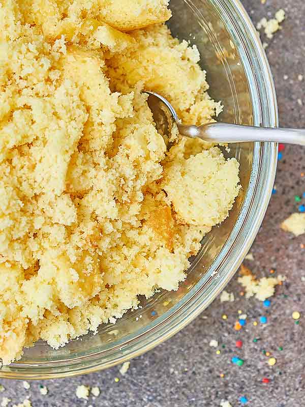 crumbled cake in bowl above