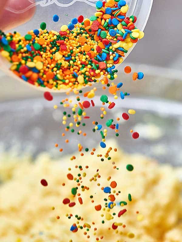 sprinkles being dumped into bowl