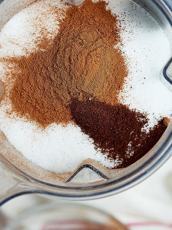 Closeup of vanilla chai tea latte ingredients in blender