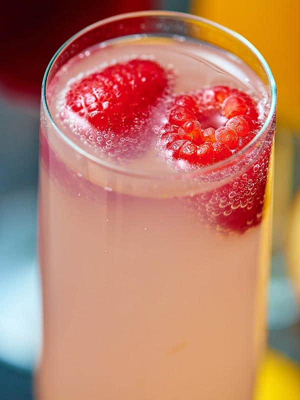 Raspberry royale cocktail with two raspberries