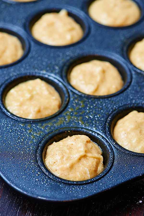muffin batter in muffin tin
