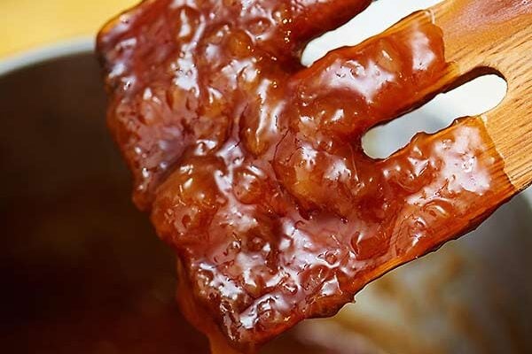 This ham with pineapple sauce is going to blow you away! The ham is so moist and salty and the sauce is just the right amount of sweet to contrast :) showmetheyummy.com #ham #dinner #christmas #holiday #pineapple #pineapplesauce