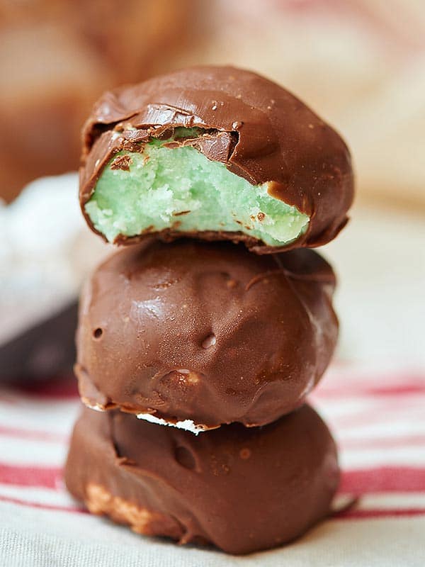Three pieces of mint chocolate candy stacked