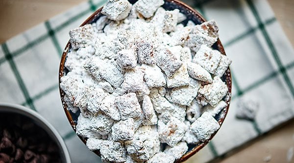 This is the best puppy chow recipe! Now, I know you probably just rolled your eyes, because who doesn't know how to make puppy chow?! Here's the thing. Most people don't make it right! In my recipe, the ingredients are the same, so what makes my puppy chow even better? The ratio! More chocolate, more peanut butter, more powdered sugar! showmetheyummy.com #puppychow #muddybuddies #recipe #chocolate #peanutbutter #snacks