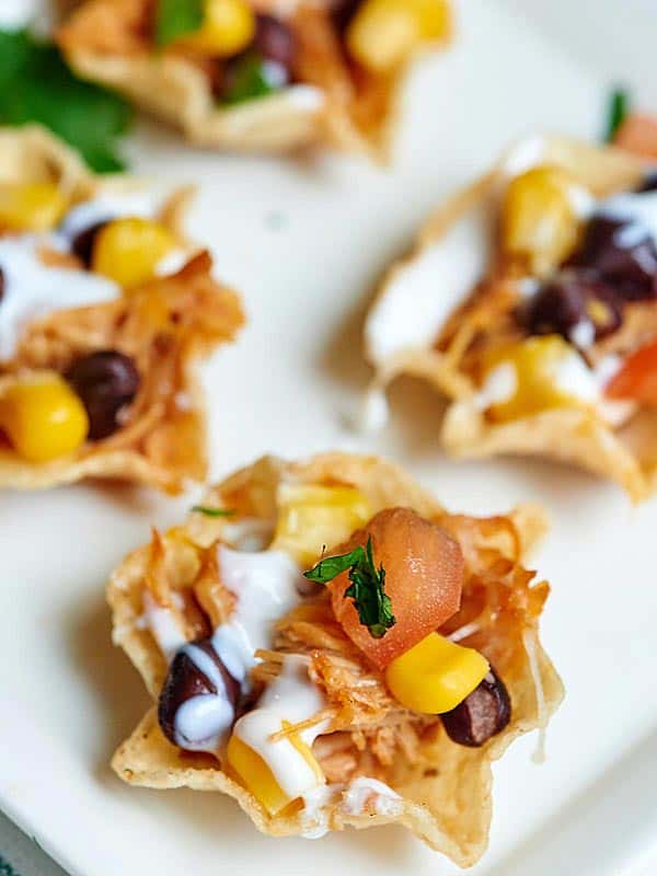 bbq chicken nachos on plate above