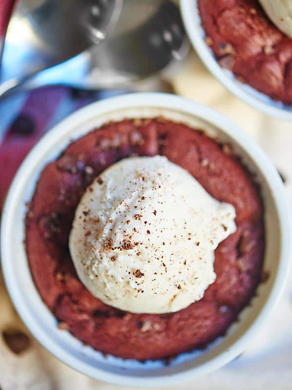 deep dish red velvet cookie with scoop of ice cream above