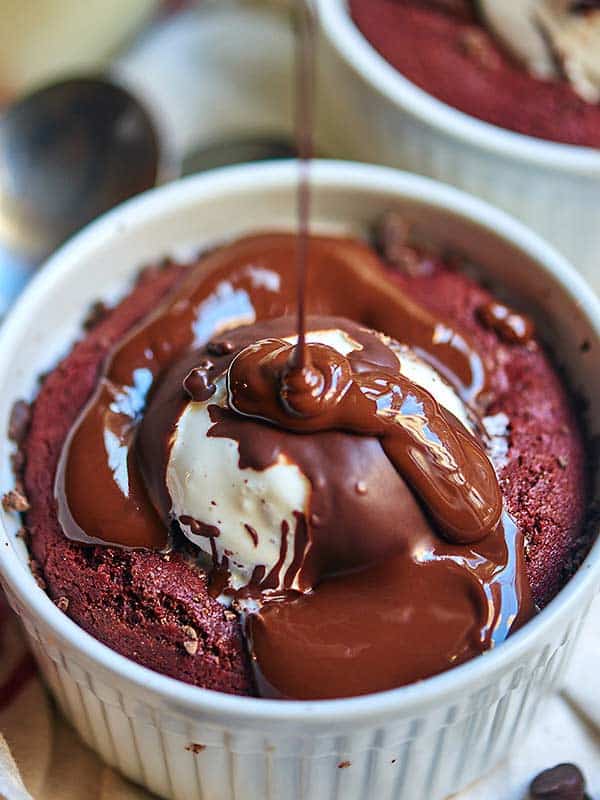 chocolate drizzled over deep dish red velvet cookie