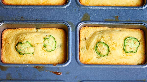 This one bowl jalapeno cheddar cornbread is an easy, less mess, one bowl, delicious addition to your Super Bowl! It's moist, a little bit sweet, so tender and thick, and has the right amount of spice! The perfect companion to chili! showmetheyummy.com #jalapeno #cheddar #cornbread #honey #superbowl #recipes