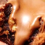 These peanut butter cup stuffed brownie bites are oogey gooey at it's finest! While these brownie bites would be great without the peanut butter cups, because they're so moist and fudgy, the Reese's really takes it to the next level! Biting into a rich, chewy brownie, and a melty peanut butter cup is pure heaven. showmetheyummy.com #brownies #dessert #browniebites #peanutbuttercup #reeses #stuffedbrownies #candy