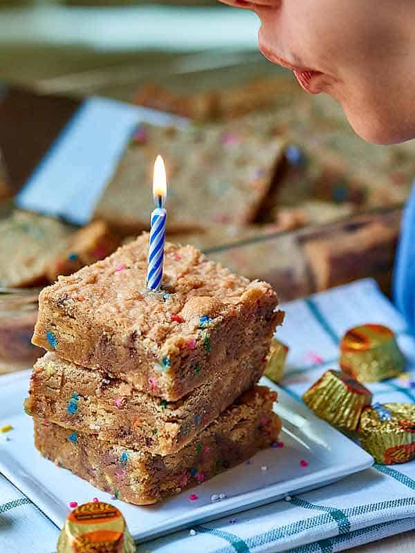 3 blondies stacked on plate