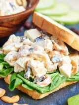 This greek yogurt chicken salad is a lighter version of a truly classic and delicious dish! I love serving this for lunch or dinner on toasted bread with spinach, over a bed of lettuce, or on crackers. If I'm snacking, I love eating this right off the spoon or on granny apple smith slices! showmetheyummy.com #chickensalad #healthy #lightenedup #sandwiches #lunch