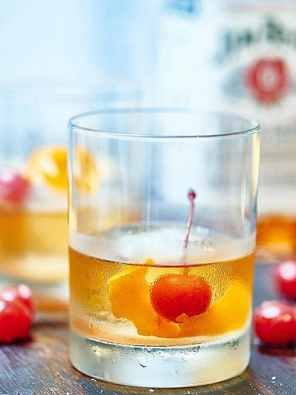 A classic cocktail that is enjoyed by many, an old fashioned cocktail recipe is made at home to be enjoyed whenever you like! showmetheyummy.com #whiskey #rye #bourbon #oldfashioned #cocktails #cherry #orange #bitters #sugar