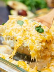 These salsa verde enchiladas are made with a homemade salsa verde, stuffed with chicken and tons of melty cheese, and smothered in heavy cream! showmetheyummy.com #salsa #chicken #tortillas #corntortillas #enchiladas #cheese