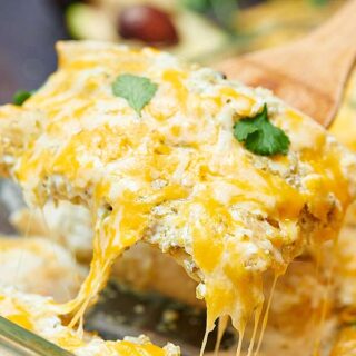 These salsa verde enchiladas are made with a homemade salsa verde, stuffed with chicken and tons of melty cheese, and smothered in heavy cream! showmetheyummy.com #salsa #chicken #tortillas #corntortillas #enchiladas #cheese