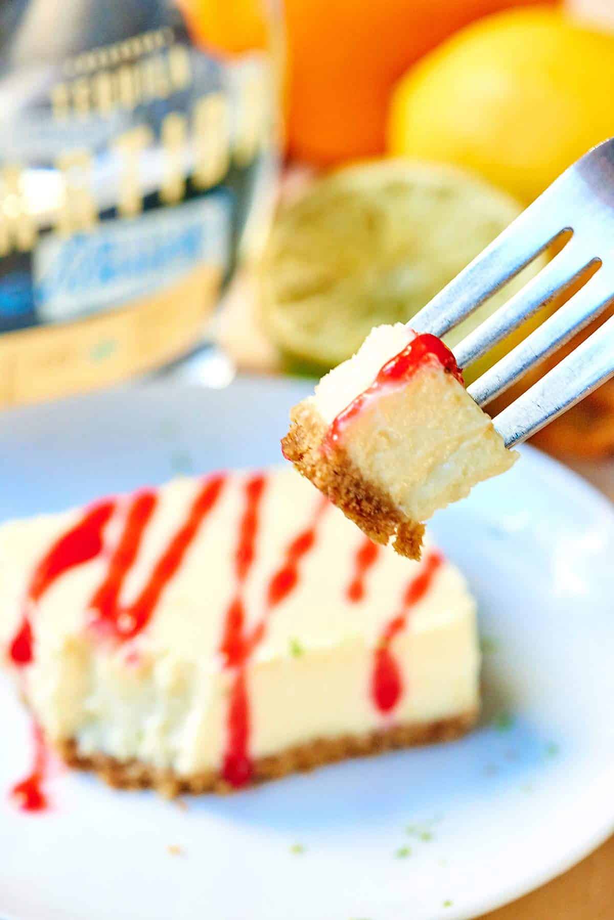 Tequila Lime Cheesecake Bars w/ Raspberry Sauce