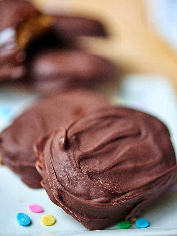 Chocolate covered eggs on plate