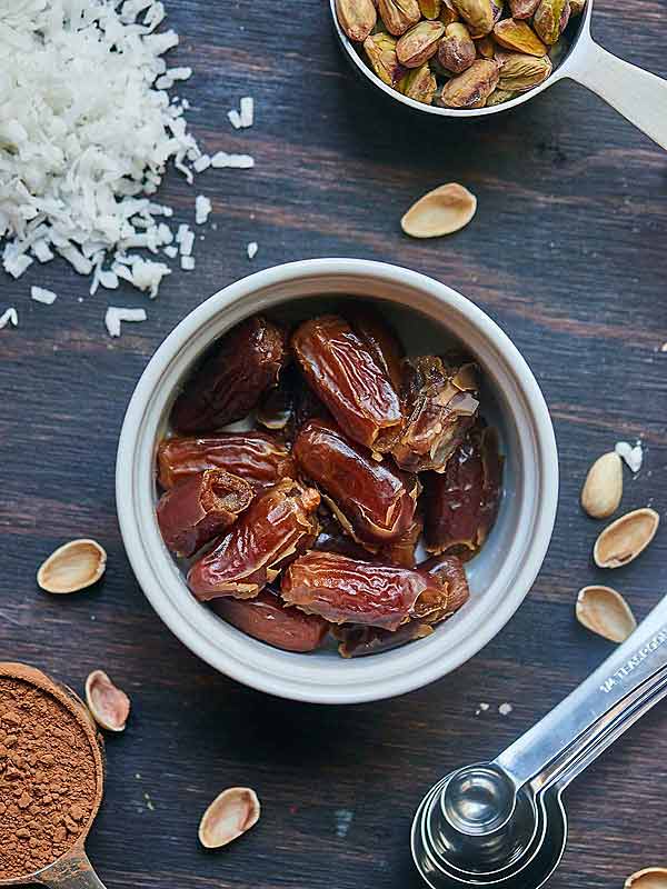 medjool dates in bowl above