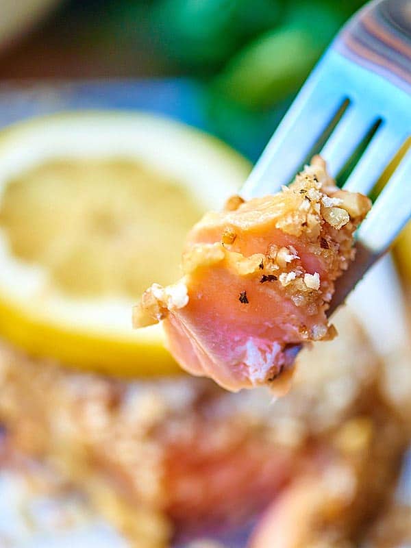 bite of salmon on fork