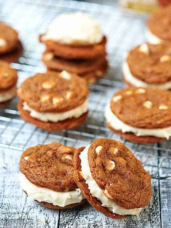 Carrot Cake Cookies with Toasted Coconut Cream Cheese Frosting. A sweet treat for Easter day! showmetheyummy.com #carrotcake #easter #creamcheese #frosting #coconut #cookies #spring