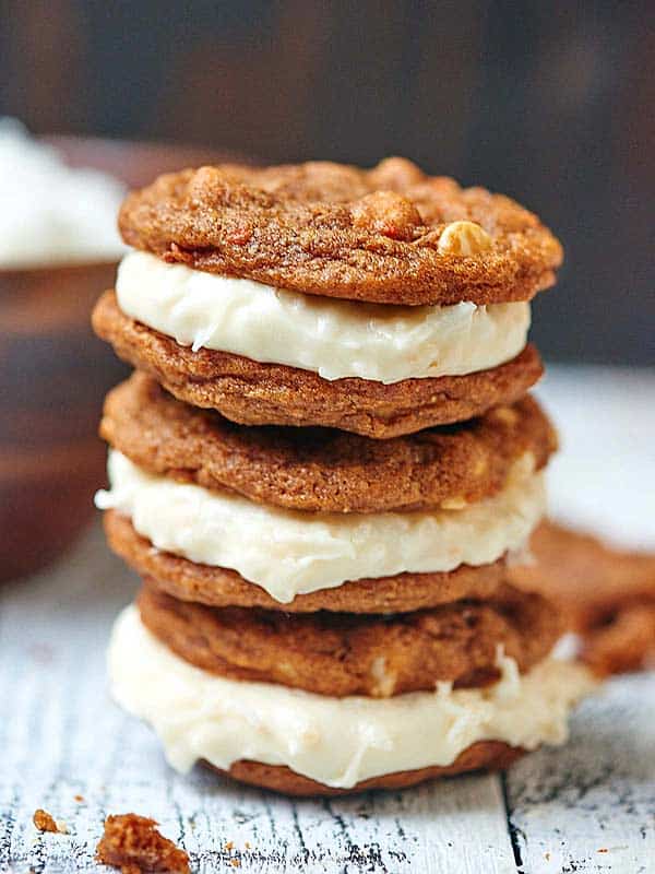 Carrot Cake Cookies with Toasted Coconut Cream Cheese Frosting. A sweet treat for Easter day! showmetheyummy.com #carrotcake #easter #creamcheese #frosting #coconut #cookies #spring