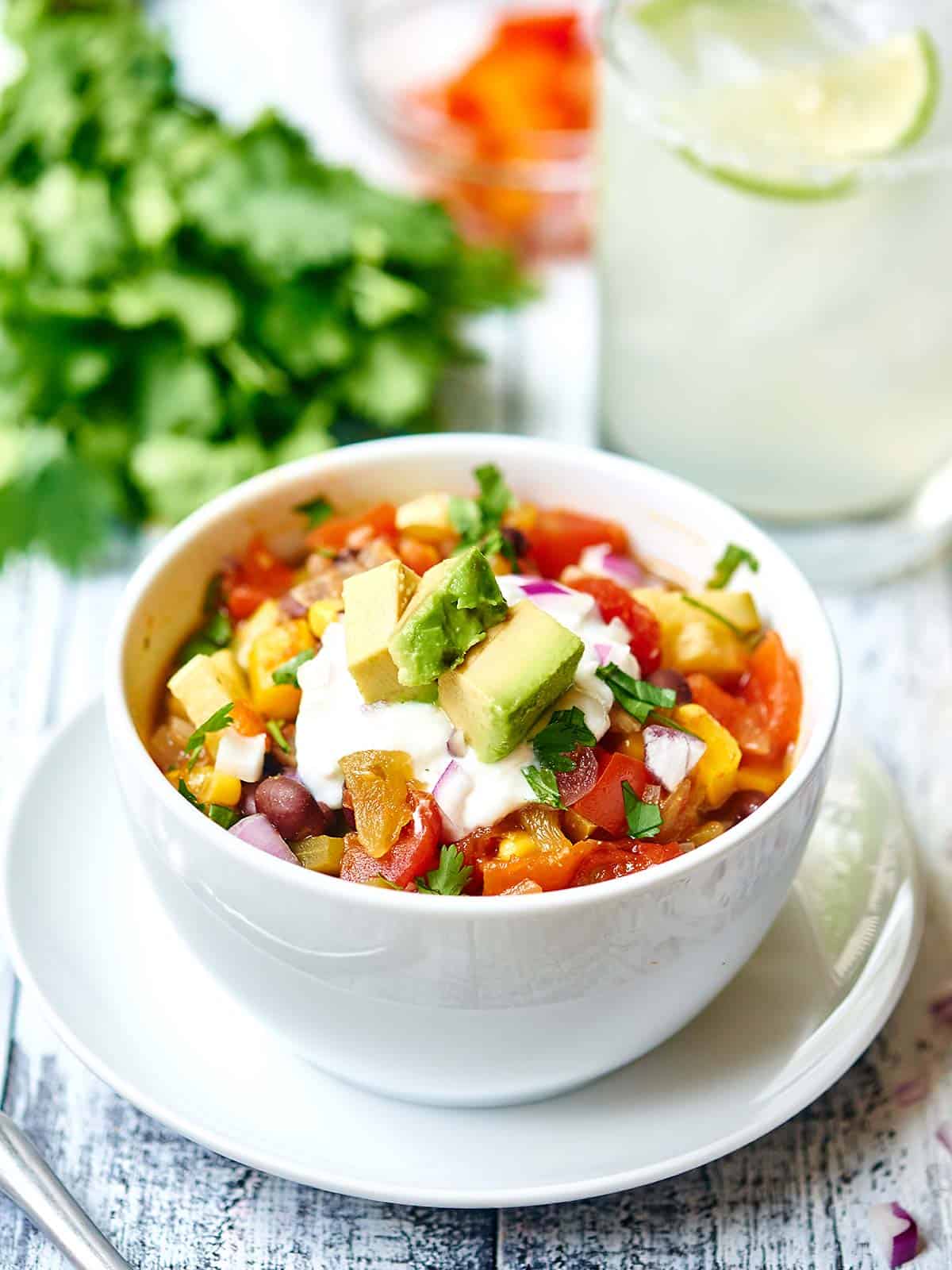 Mexican vegetable soup in bowl side view