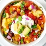 This Mexican Vegetable Soup is chock full of veggies, subtly spicy, and makes a ton! Make it today for Meatless Monday and enjoy it all week long! Less than 400 calories per serving! showmetheyummy.com #meatlessmonday #healthy #vegetarian #blackbeans #mexican #soup
