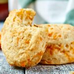 These roasted garlic cheddar beer biscuits are easy to make and totally sinful! A tender biscuit made with Blue Moon and stuffed with roasted garlic, shredded cheddar cheese, and rosemary. showmetheyummy.com #biscuits #vegetarian #beer #roastedgarlic #cheddar