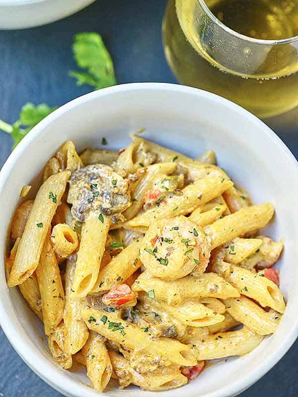 bowl of cajun shrimp and chorizo pasta above