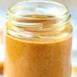 This homemade maple almond butter is so much better than store bought! I roast the almonds in maple syrup, which gives the butter a really rich flavor. I then stir in cinnamon and vanilla which adds so much warmth! Did I mention it’s easy to make, vegan, and gluten free? showmetheyummy.com #almondbutter #almond #maple #cinnamon #vanilla #vegan #glutenfree