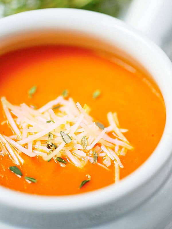 closeup of bowl of red pepper soup