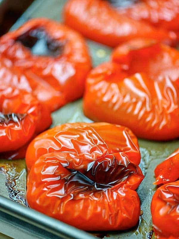 roasted red peppers on baking sheet