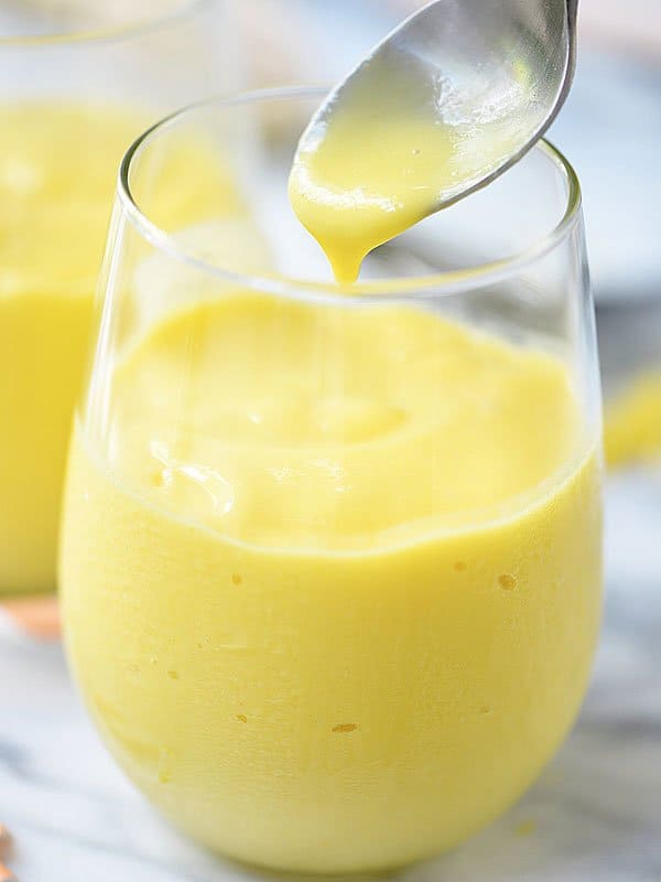 Cup of mango smoothie