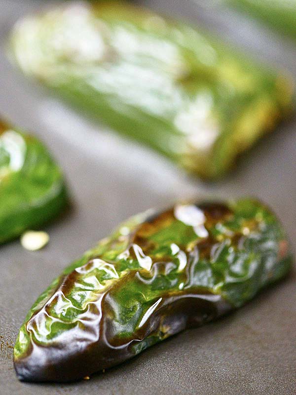 roasted jalapeno peppers on baking sheet closeup