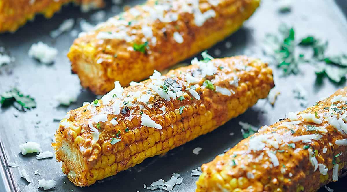 mexican grilled corn on baking sheet