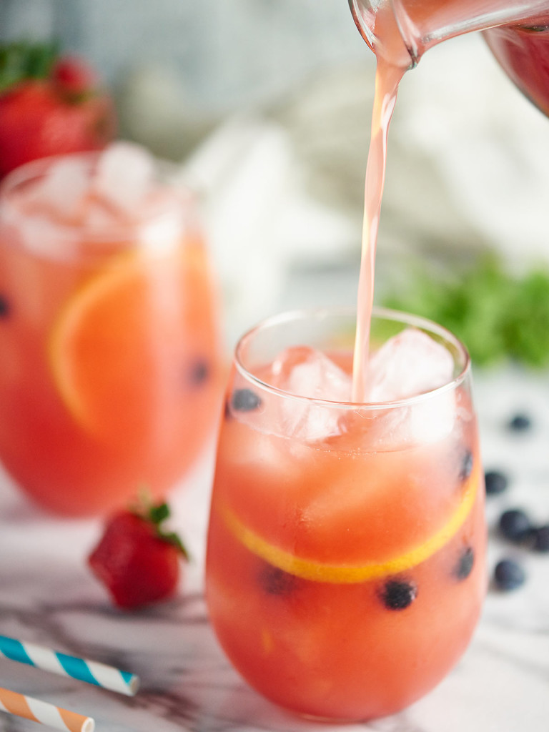 Watermelon Sangria with White Wine, Triple Sec, and Strawberry Vodka!