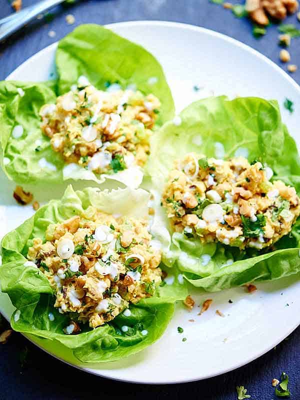 3 healthy chickpea lettuce wraps on plate above