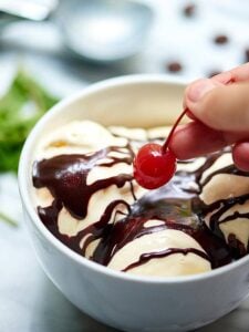 Only 10 minutes to make the easiest hot fudge sauce! Perfect over ice cream, in a shake, or even straight off the spoon! Better than store bought! showmetheyummy.com #icecream #chocolate