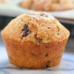 Looking for moist, jumbo, bakery style muffins? Good! These Chocolate Chip Muffins are for you! They're easy to make and there's chocolate in every bite. showmetheyummy.com #breakfast #muffin
