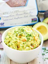 This easy guacamole recipe is vegan, gluten free, and healthy! This guacamole only has 8 ingredients and takes 5 minutes to put together! showmetheyummy.com #vegan #glutenfree #foodshouldtastegood @foodshouldtastegood