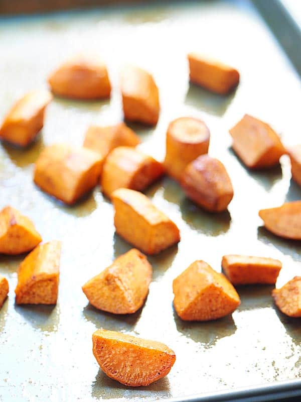 roasted sweet potato chunks on baking sheet