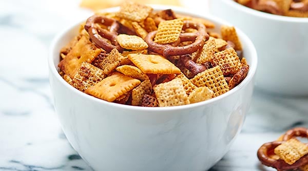 Chex mix that's made in the crockpot?! Yes please! This slow cooker chex mix is easy to make, flavored w/ ranch seasoning, & addicting! You've been warned. showmetheyummy.com #slowcooker #chexmix