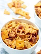 Chex mix that's made in the crockpot?! Yes please! This slow cooker chex mix is easy to make, flavored w/ ranch seasoning, & addicting! You've been warned. showmetheyummy.com #slowcooker #chexmix
