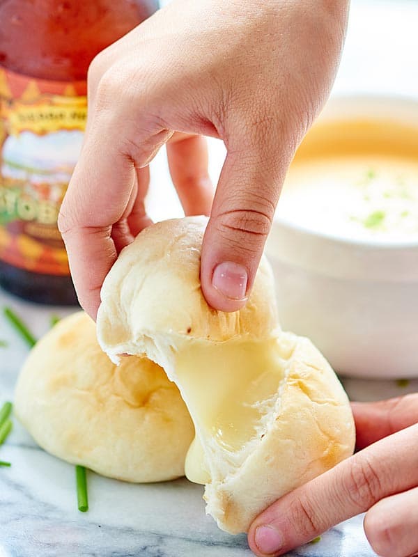 cheese bomb being torn in half, cheese pull